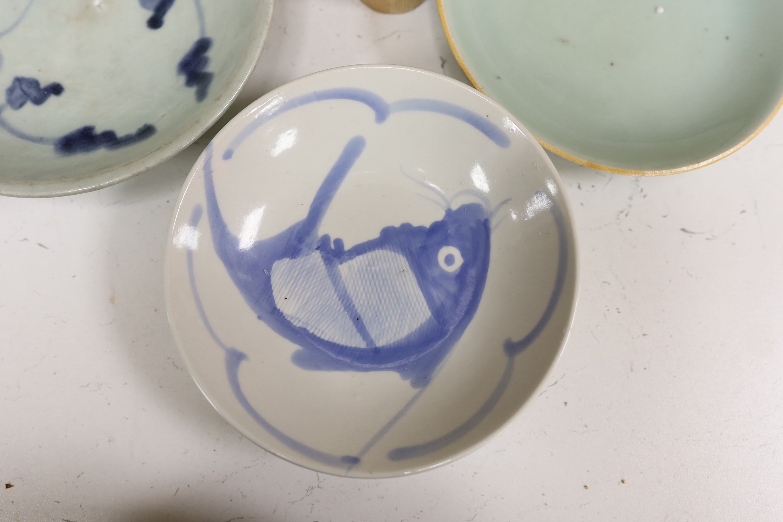 A group of Chinese plates and dishes including a Ming dynasty blue and white bowl